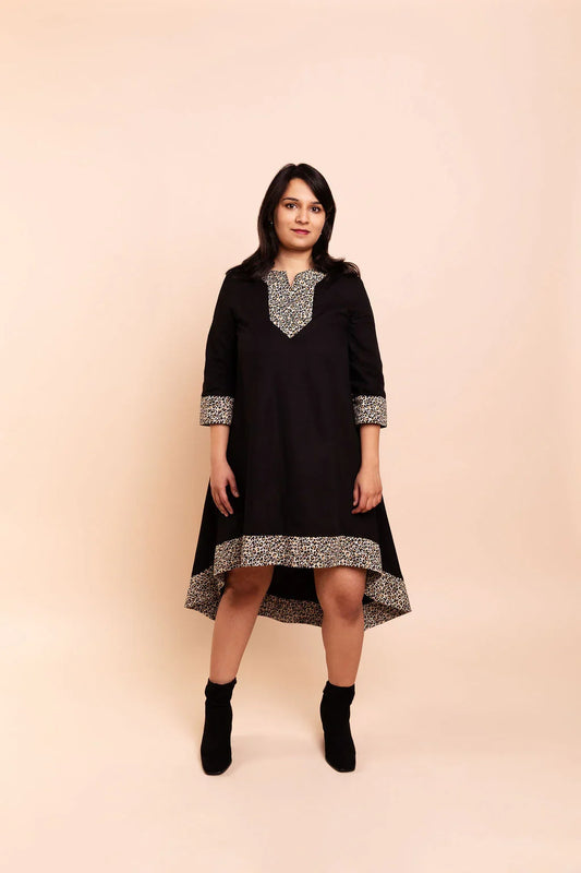 MAYA - Black dip hem dress with a touch of animal print
