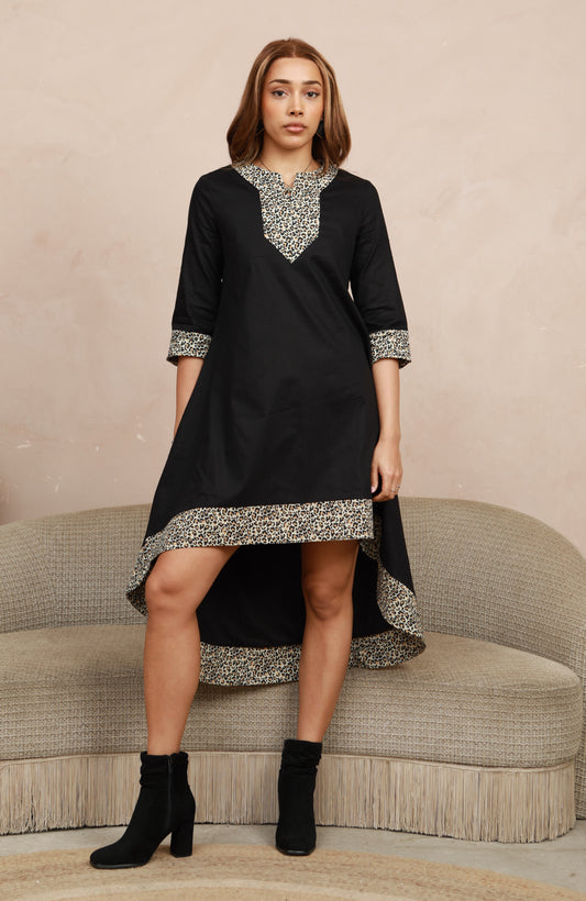 MAYA - Black dip hem dress with a touch of animal print